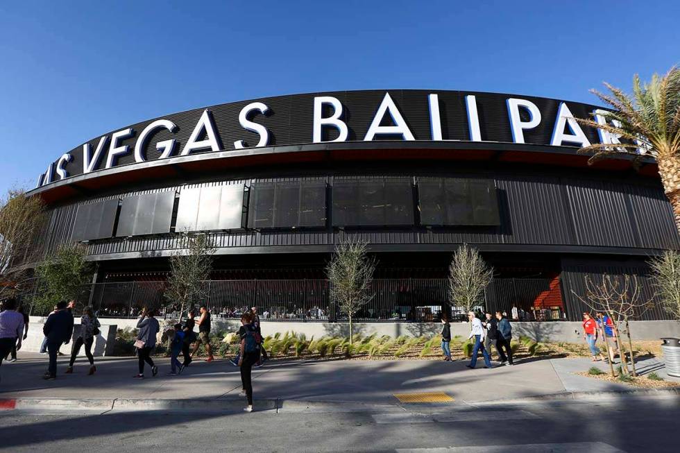 fans line up to enter the Las Vegas Ballpark for the Las Vegas Aviators' home opener in Downtow ...