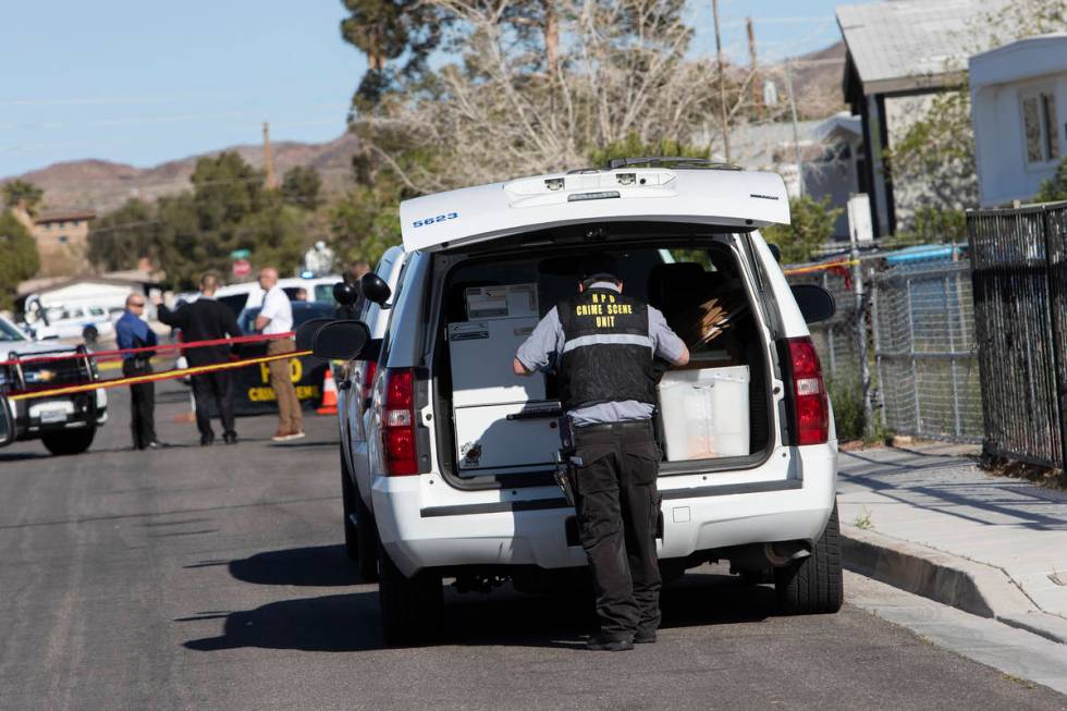 The Henderson Police Department investigates a homicide Friday afternoon, March 27, 2020, in a ...