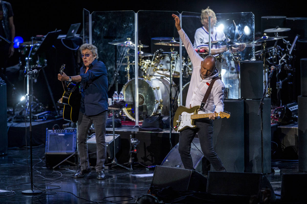 Roger Daltrey and guitarist Pete Townshend of The Who finish the song "Who Are You" at the Colo ...