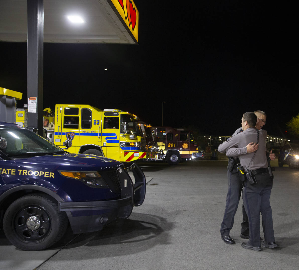 Members of law enforcement mourn the loss of Nevada Highway Patrol Sgt. Benjamin Jenkins, 47, w ...