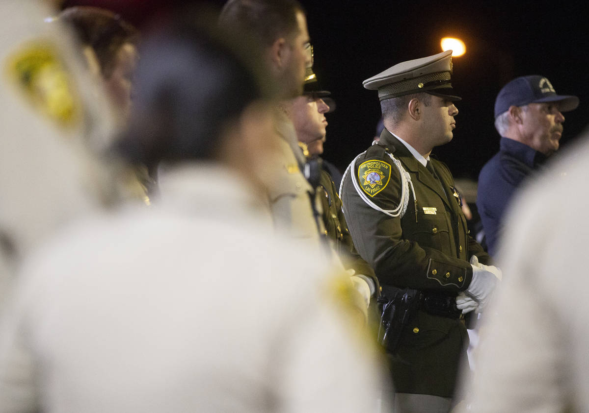 Members of law enforcement meet before starting the procession for Nevada Highway Patrol Sgt. B ...