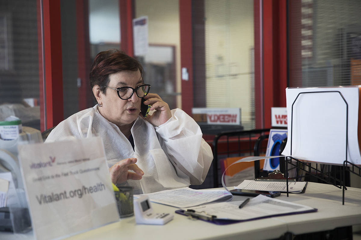 Joan Young, a donor relations specialist, speaks on the phone with a donor at Vitalant, a nonpr ...