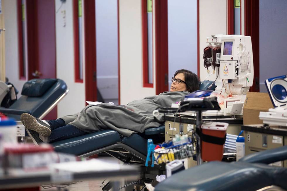 Kelly Groenlykke waits to give blood at Vitalant, a nonprofit that collects blood from voluntee ...