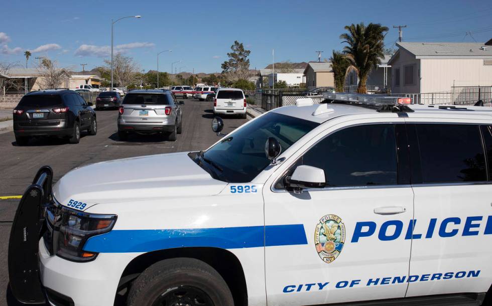 The Henderson Police Department investigates a homicide Friday afternoon, March 27, 2020, in a ...