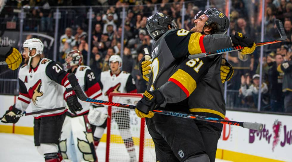 Vegas Golden Knights left wing Max Pacioretty (67, left) celebrates a goal by Vegas Golden Knig ...