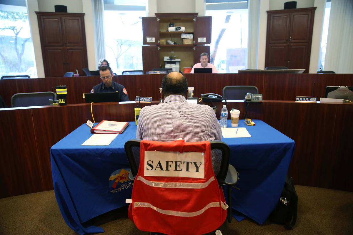 City of North Las Vegas city risk manager Alonzo Johnson, center, serving as safety officer, wo ...