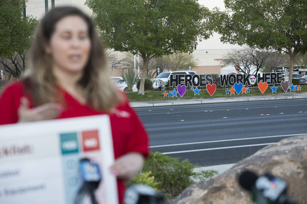 Nicole Koester, a nurse and representative for National Nurses United, addresses the media abou ...