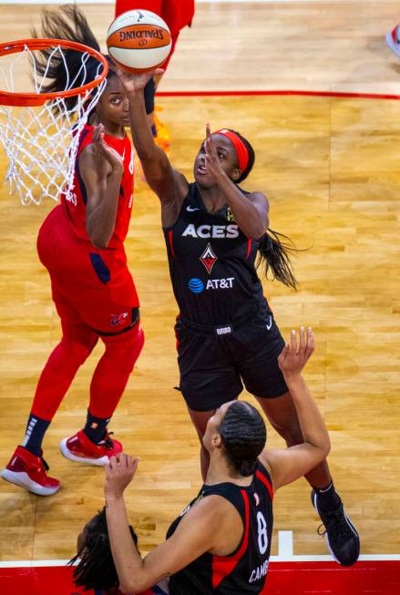 Las Vegas Aces guard Jackie Young (0) gets inside for a basket versus the Washington Mystics du ...