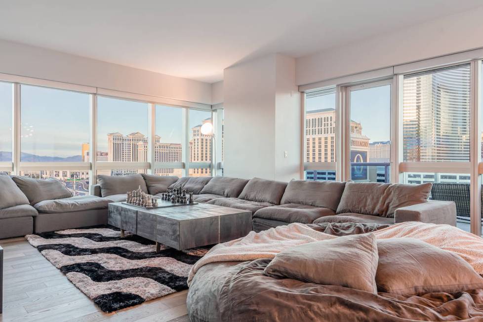 The condo has a large living room. (Red Luxury Real Estate)