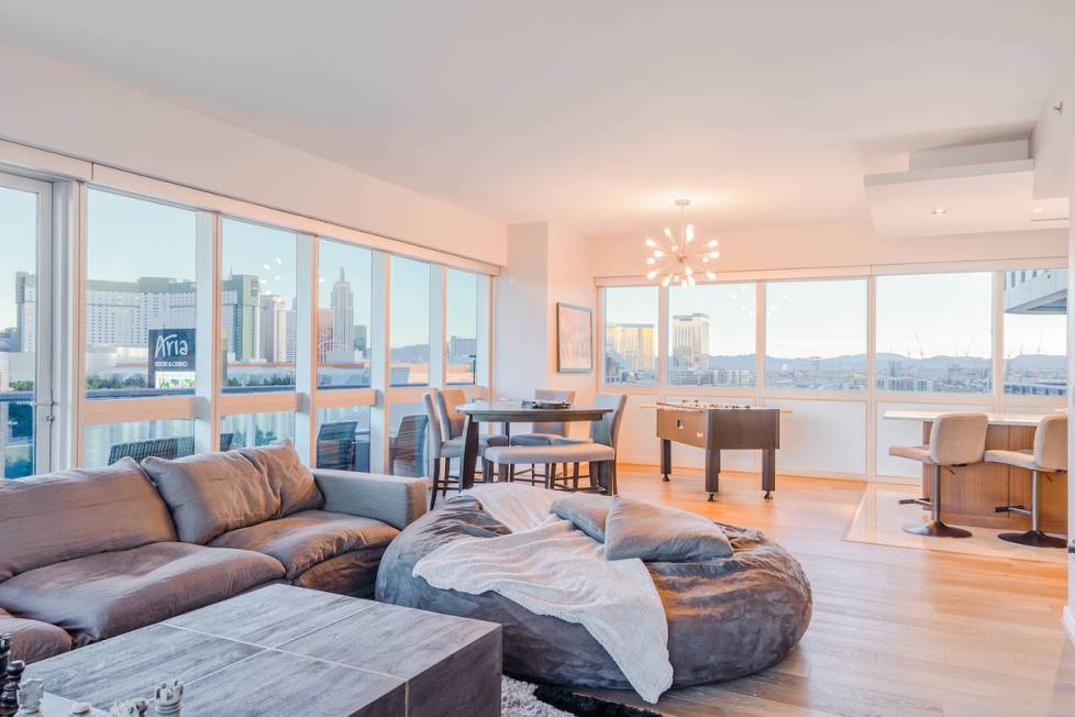 The condo has a large living room. (Red Luxury Real Estate)