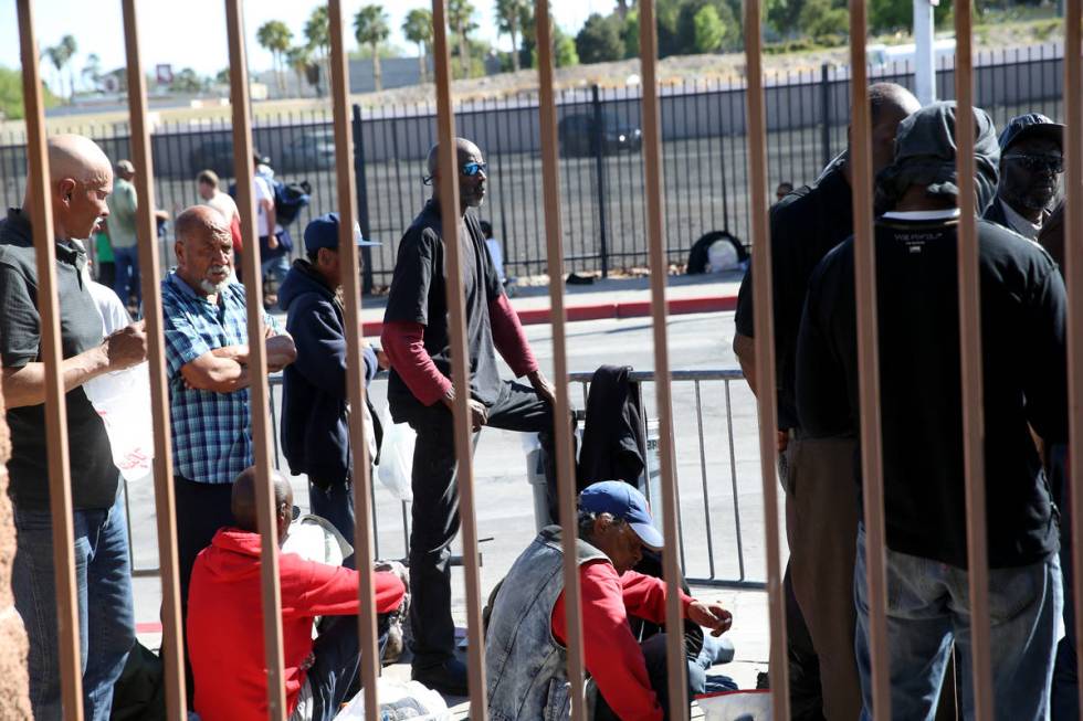 Homeless line up on Foremaster Lane in Las Vegas as Catholic Charities of Southern Nevada re-op ...