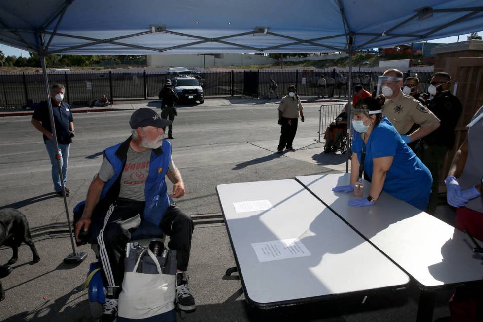 Roger LaBrie, 57, is screened by Southern Nevada Health District Community Health Nurse Supervi ...