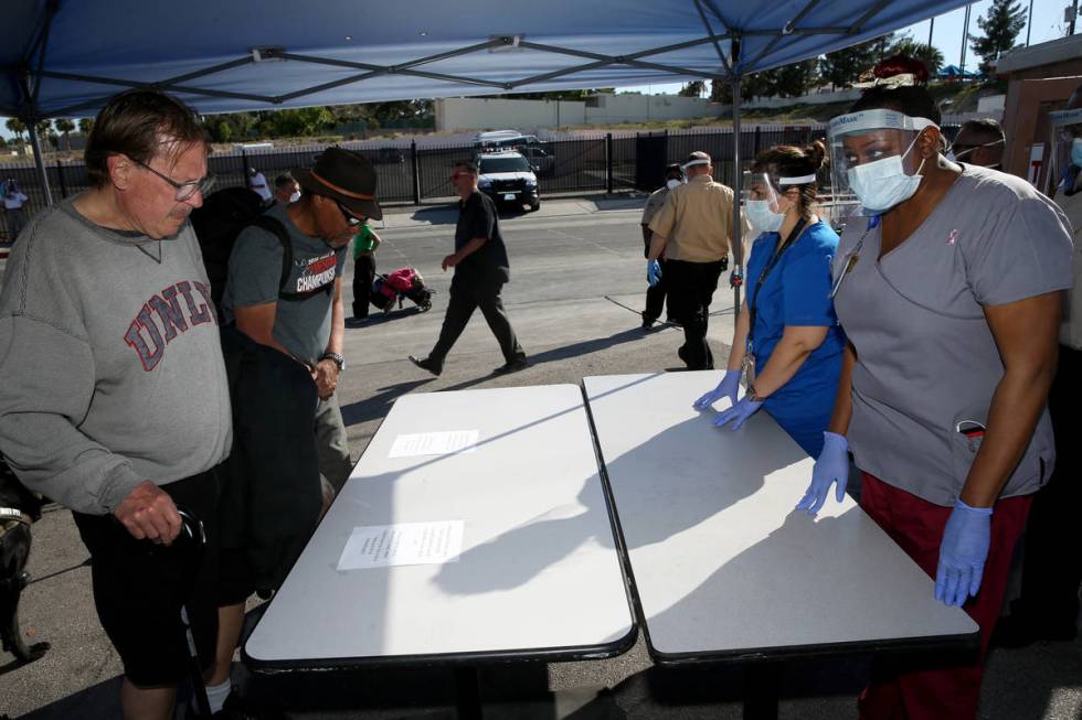 Southern Nevada Health District Community Health Nurse Tasheka Powell, right, and Supervisor Su ...