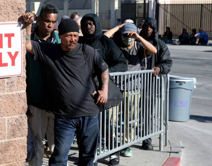 Homeless line up on Foremaster Lane in Las Vegas as Catholic Charities of Southern Nevada re-op ...