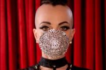 Michelle L'Amour, creator of "Quarantine Cabaret," is shown with her customized pandemic mask. ...