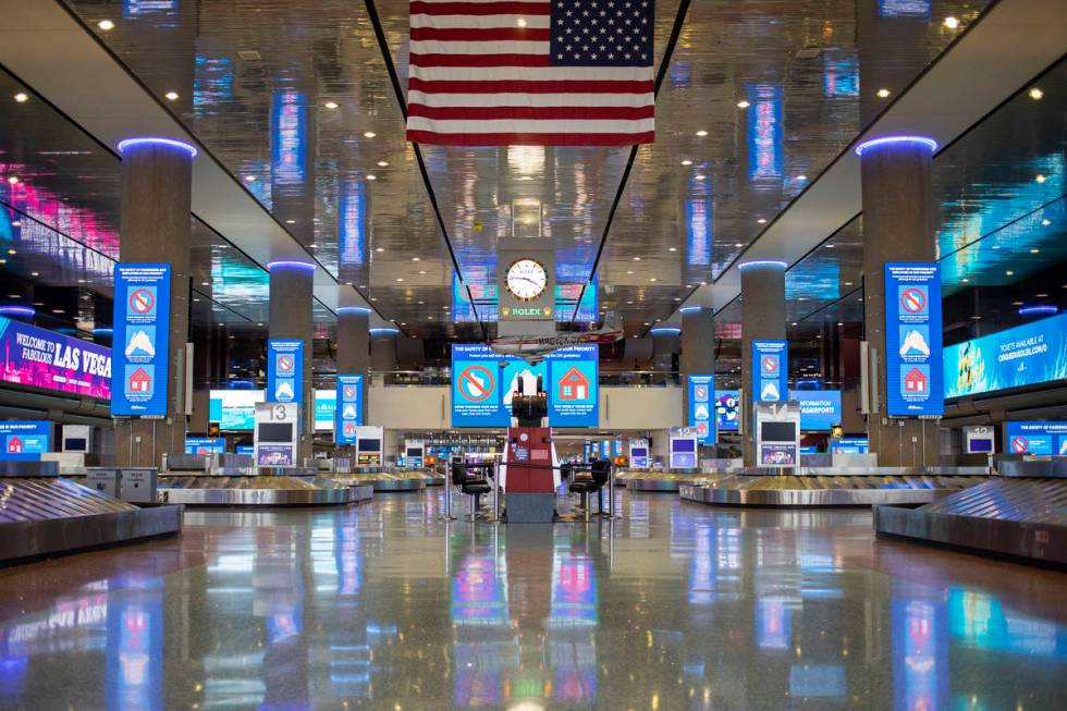 No travelers can be seen at baggage claim in Terminal 1 at McCarran International Airport on We ...