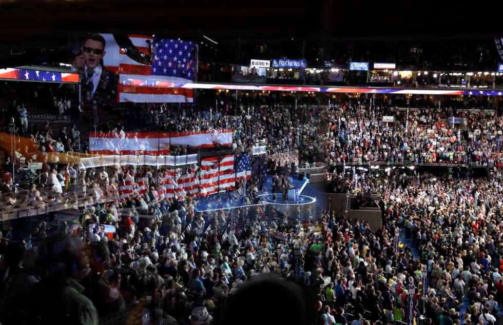 The stage is reflected on a glass window on the suite level at Wells Fargo Arena at the Democra ...