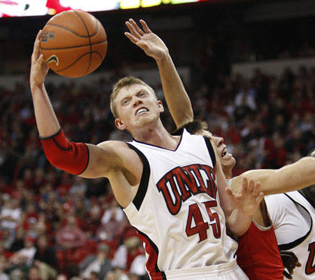 Joe Darger of UNLV grabs a rebound against New Mexico during their game at the Thomas & Mack Ce ...