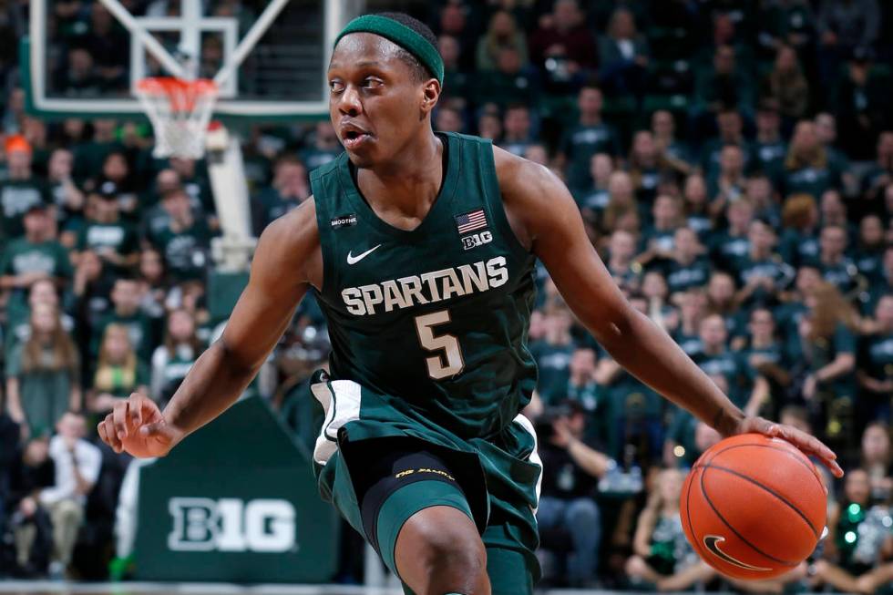 In this Feb. 4, 2020, file photo, Michigan State's Cassius Winston drives against Penn State du ...