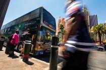 Passengers board an RTC bus north of the MGM Grand on the Strip on Tuesday, Aug. 13, 2019 in La ...