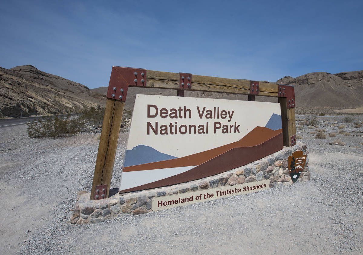 A sign marks the entrance to Death Valley National Park, Calif., on Thursday, July 26, 2018. Ri ...