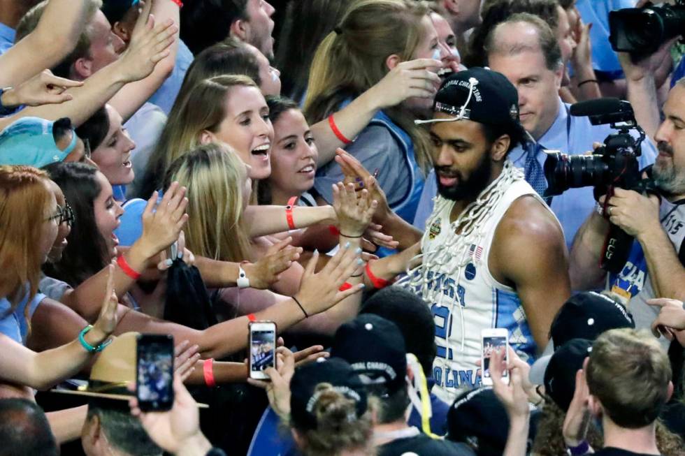 FILE - In this April 3, 2017, file photo, North Carolina guard Joel Berry II celebrates with fa ...