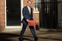 Britain's Secretary of State for Foreign Affairs, Dominic Raab, arrives in Downing Street as Br ...