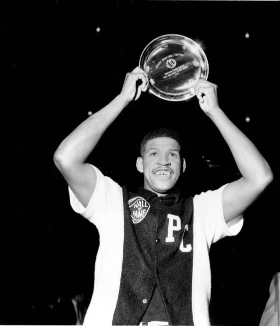 Jimmy Walker of Providence College shows his award as the most valuable player of the Eastern C ...