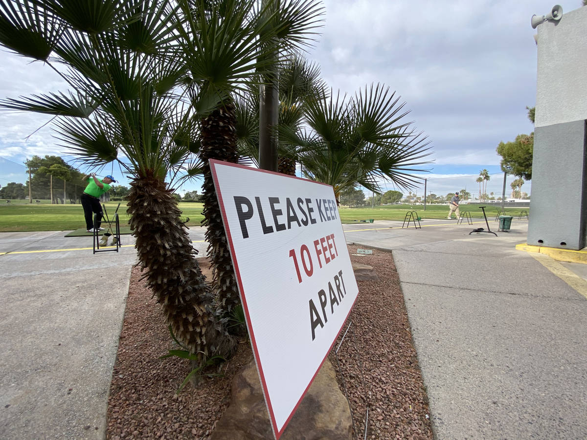 A social distancing sign at Las Vegas National Golf Club Wednesday, April 8, 2020. Golf courses ...