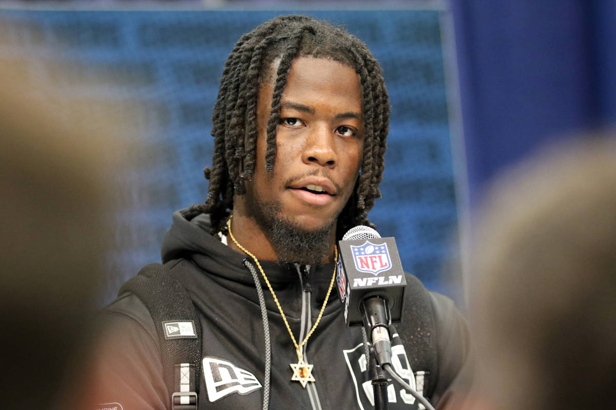 Alabama wide receiver Jerry Jeudy answers questions during a news conference at the NFL scoutin ...