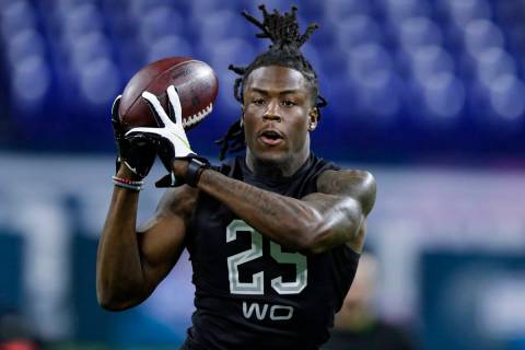 Alabama wide receiver Jerry Jeudy runs a drill at the NFL football scouting combine in Indianap ...