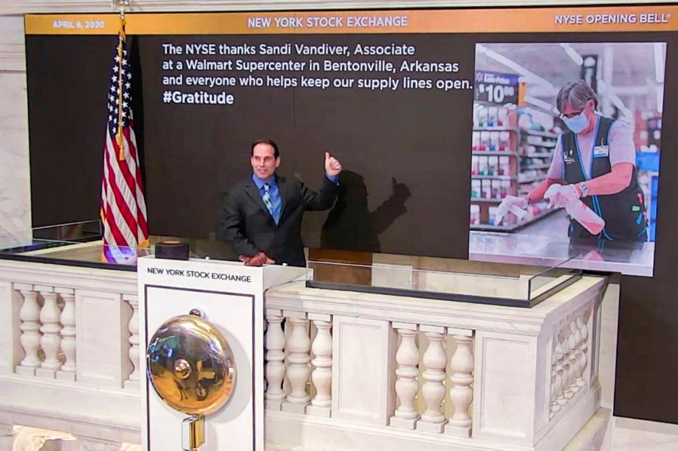 In this photo taken from video provided by the New York Stock Exchange, Kevin McSpedon, Assista ...