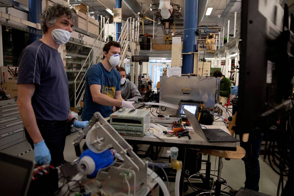 Engineers at the Vrije University of Brussels test respirator equipment for eventual use with C ...