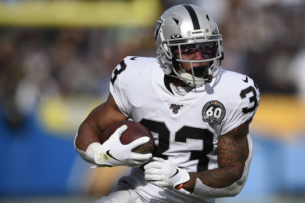 Oakland Raiders running back DeAndre Washington runs the ball during the first half of an NFL f ...