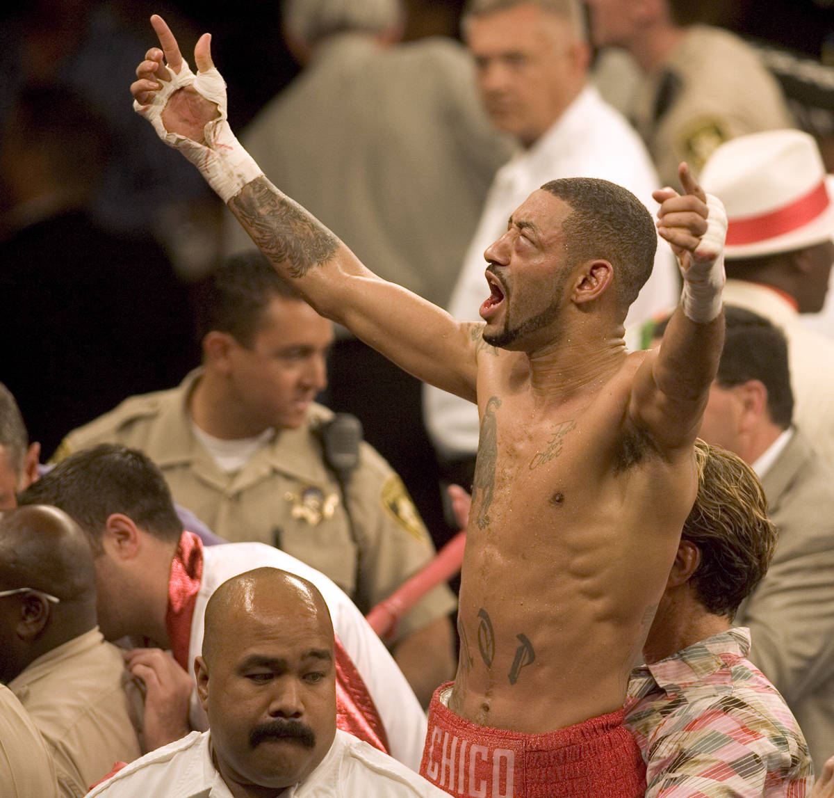 Diego Corrales celebrates his 10th round knockout of Jose Luis Castillo in their WBA/WBO lightw ...