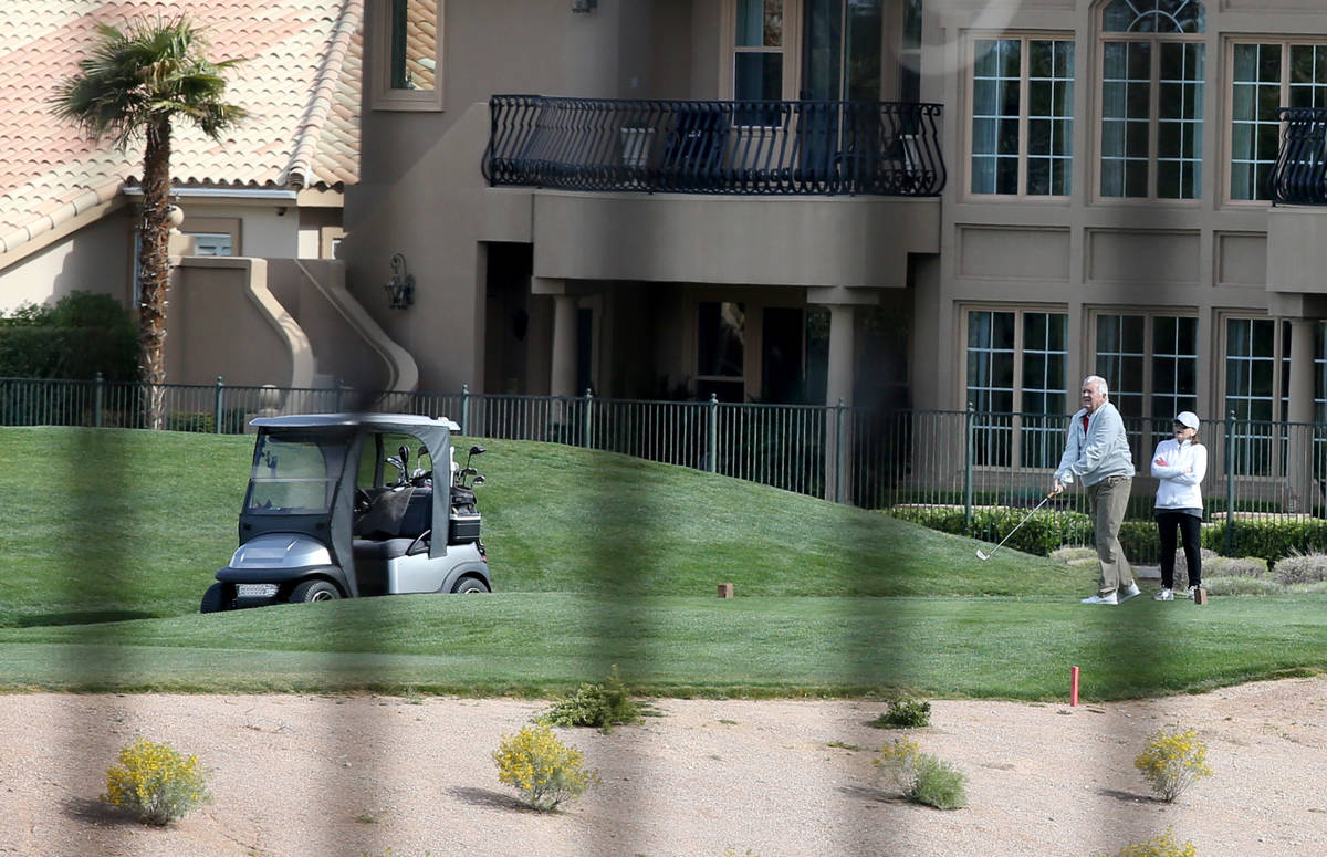 Golfers at Canyon Gate Country Club in Las Vegas Thursday, April 9, 2020. (K.M. Cannon/Las Vega ...