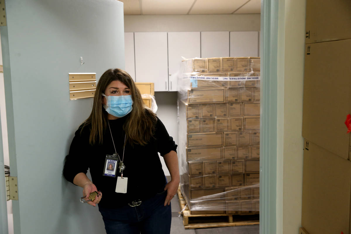 Jacqueline Saites, director of University Medical Center contracts management, shows the hospit ...