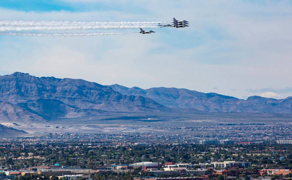 The U.S. Air Force Thunderbirds fly in formation above the Las Vegas Valley on Saturday, April ...