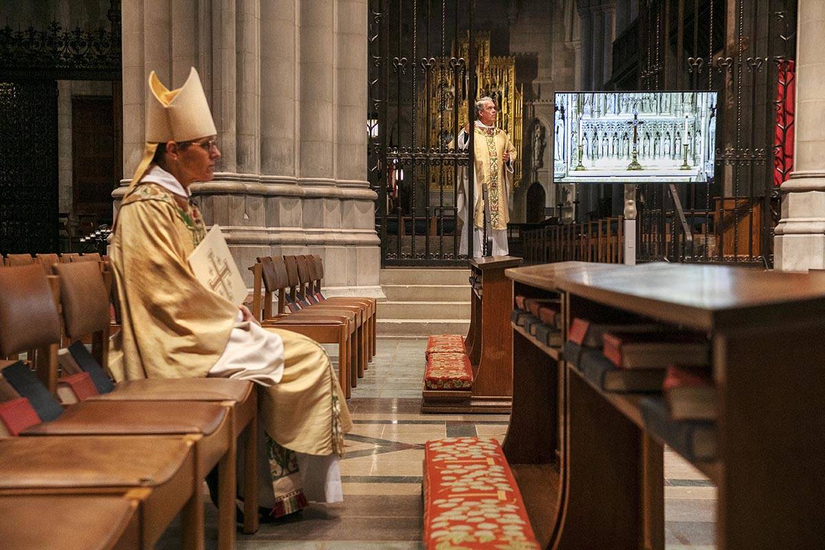 Rt. Rev. Mariann Edgar Budde, at left, Bishop of the Episcopal Diocese of Washington, and Very ...