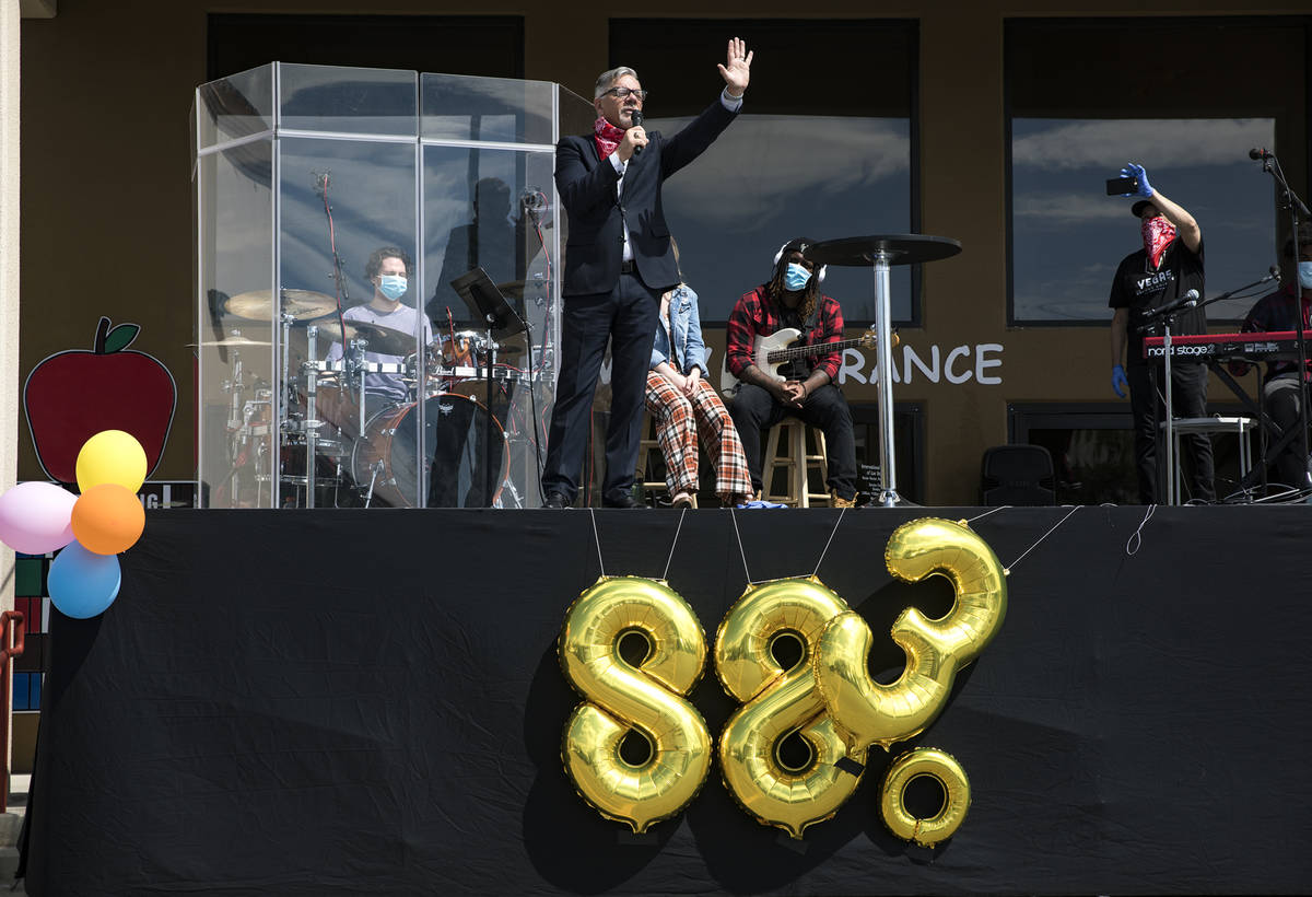 Pastor Paul Marc Goulet leads an Easter service in the parking lot at International Church of L ...