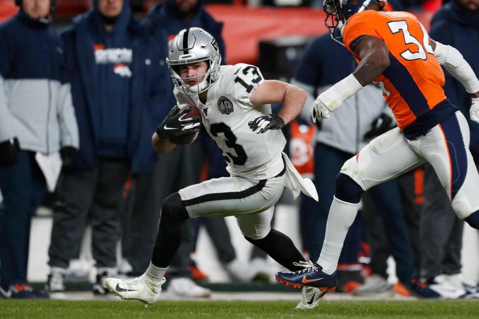 Oakland Raiders wide receiver Hunter Renfrow runs with the ball during the second half of an NF ...