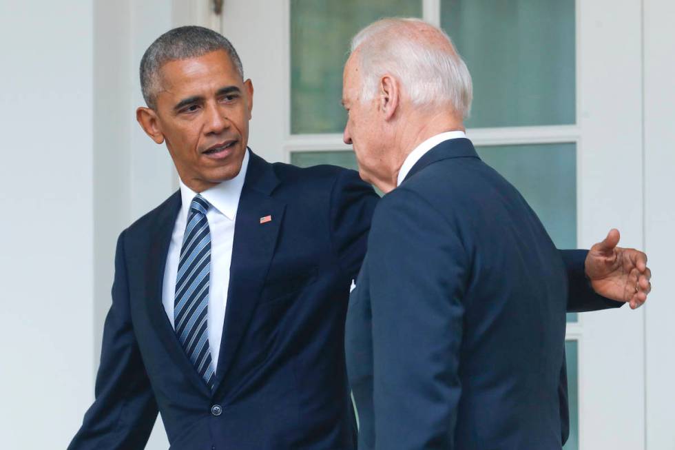 FILE - In this Nov. 9, 2016 file photo, President Barack Obama, accompanied by Vice President J ...