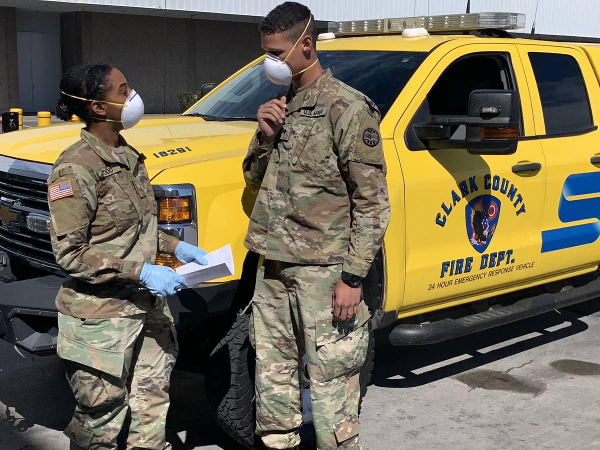 Soldiers with the 1-221 Cavalry process shipments of medical supplies in response to COVID-19, ...