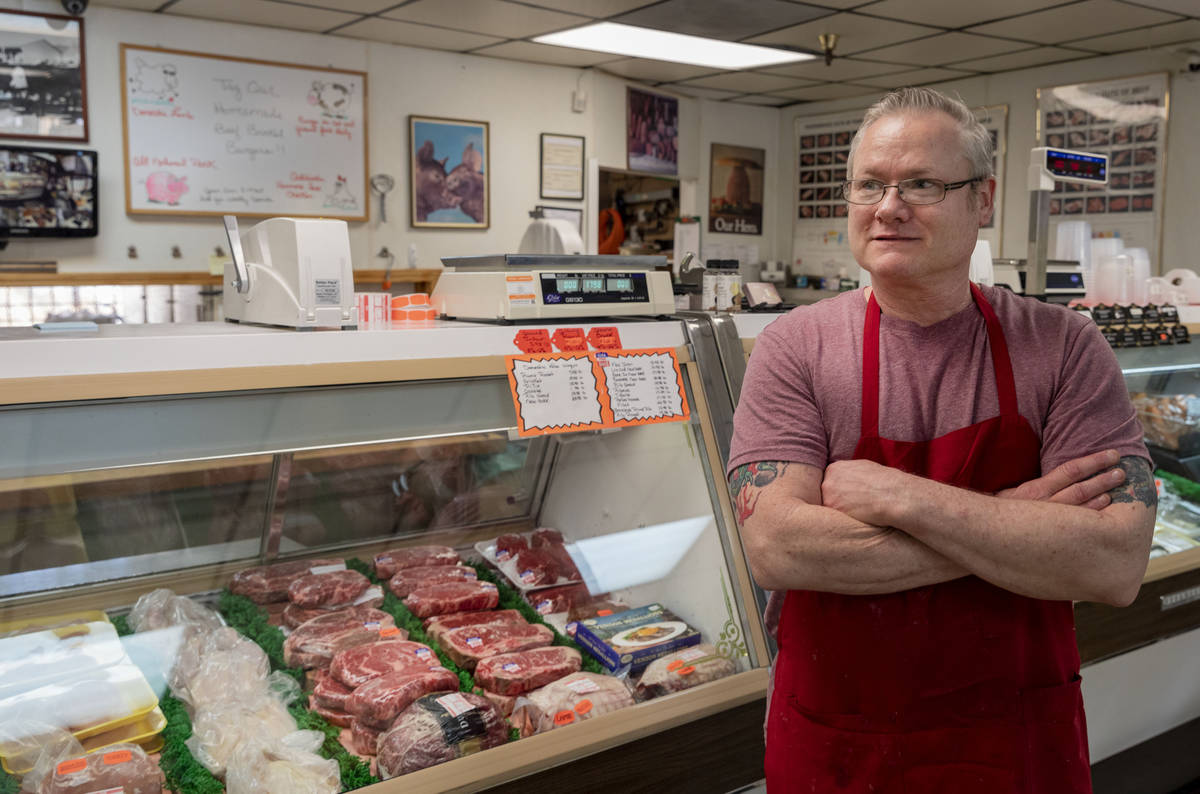 Village Meat & Wine's owner Tim Jensen is photographed at the old fashioned butcher shop in ...