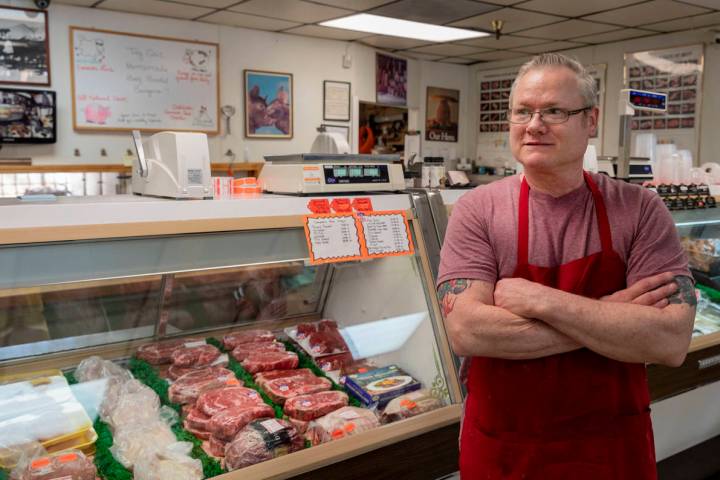 Village Meat & Wine's owner Tim Jensen is photographed at the old fashioned butcher shop in ...