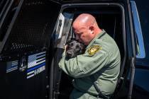 Kimura is reunited with his partner, Officer Bachman, on Wednesday. (LVMPD)