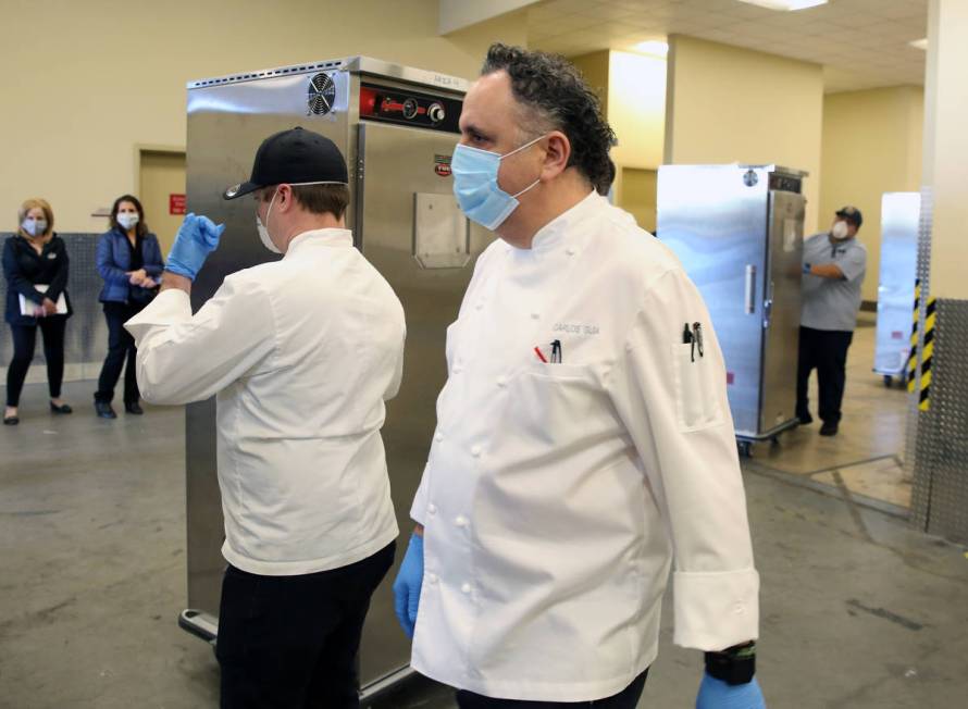 Andrew Carroll, left, executive chef at Catch Restaurant, and Carlos Guia, executive chef at Ar ...