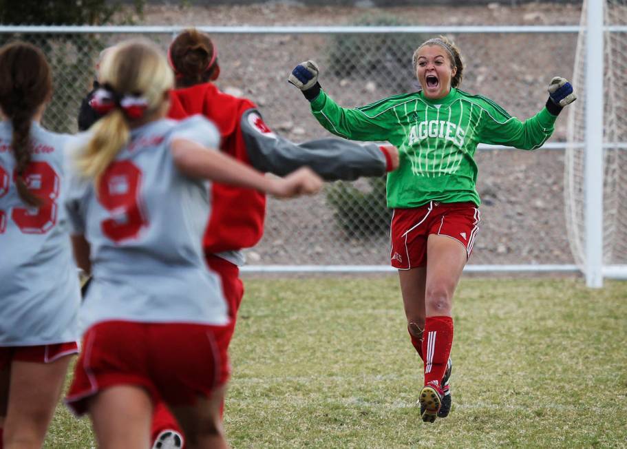 Arbor View goalie Hayley Fife, right, runs towards her teammates after making the crucial save ...