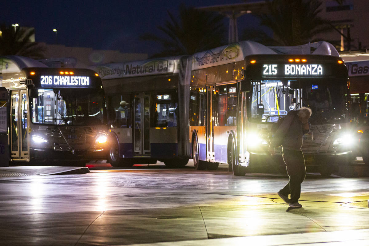 A man walks by as Regional Transportation Commission buses navigate the RTC Bonneville Transit ...