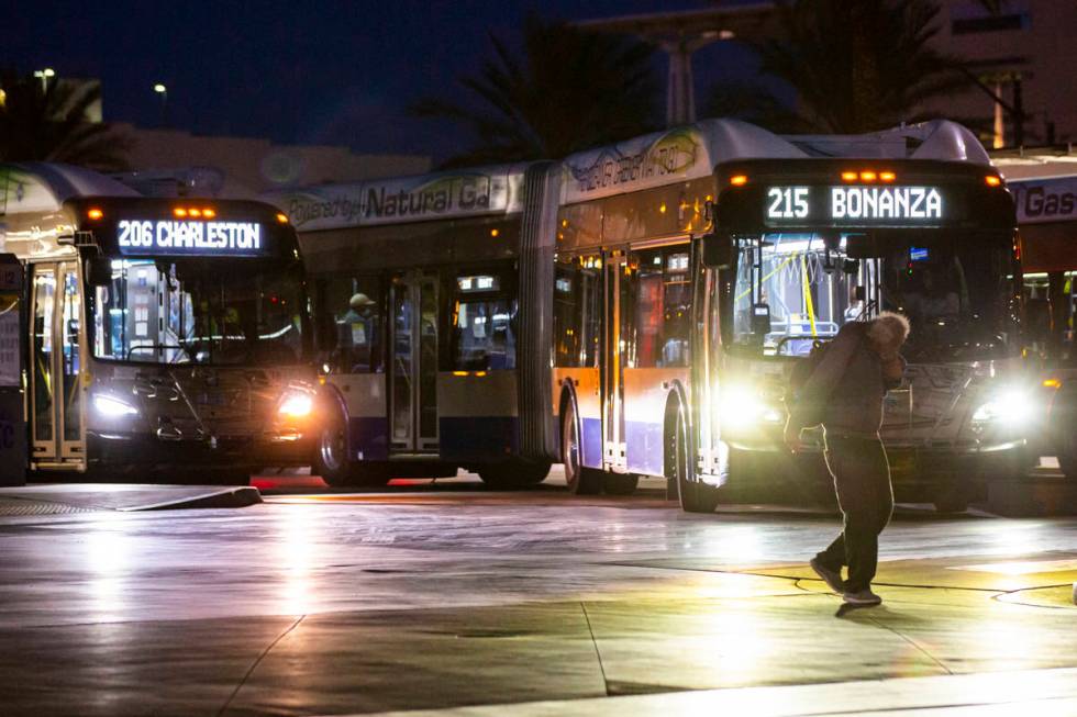 A man walks by as Regional Transportation Commission buses navigate the RTC Bonneville Transit ...